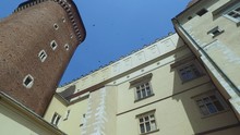 Krakow, Poland, Senatorska Tower And Facade Of Wawel Castle Royal Chambers On Sunny Day, Low Angle