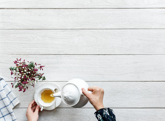 Sticker - Aerial view of hot tea drink break and relaxation concept with copy space