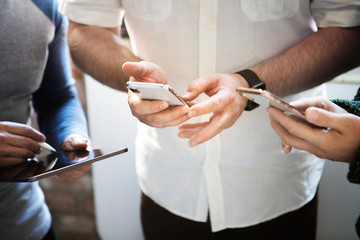 people on their phones