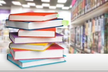 Wall Mural - Stack of colorful books collection on the desk