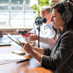 Wall Mural - Businesswoman interviewed for a podcast