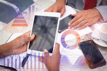 Tablet with blank screen in human hands with virtual accounting diagram. Dark skinned business woman holding digital device during meeting with partners. Communication or mobile computer concept