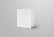 © olegphotor - Mockup of a white blank trifold, front view, standard standing roll fold brochure, isolated on background.
