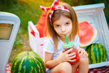 Child Drinking Watermelon Lemonade In Jar With Ice And Mint As Summer Refreshing Drink. Cold Soft Drinks With Fruit.