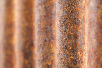 Surface of the orange rusted old zinc plate closeup.