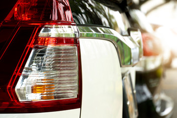 Rear view of the cars that sees the lamp in the parking lot.