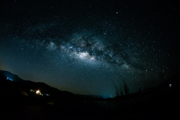 Wall Mural - backgrounds night sky with stars and milky way at thailand