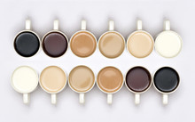 A Conceptual Shot With Milk/tea/coffee In Cups Arranged In A Manner Which Creates A Gradient Effect Of Colours. Lighter To Darker Shades Of Drinks. The Image Is On White Background Isolated