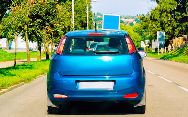 Canvas Print - Driving school car on road in Poland reflex