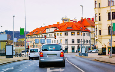 Canvas Print - Car at road in Maribor street view reflex