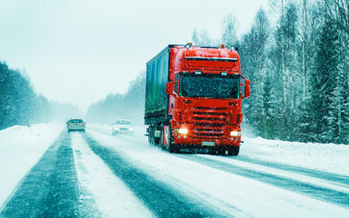 Canvas Print - Truck on Snowy winter Road at Finland in Lapland reflex