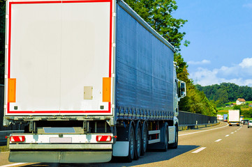 Canvas Print - Truck on roadway in canton Geneva in Switzerland reflex