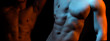 © Volodymyr - Two naked athlete with strong body. Shirtless hunks at black background. Close up of an athletic guy with perfect abs. Hunky shirtless male model outdoors.
