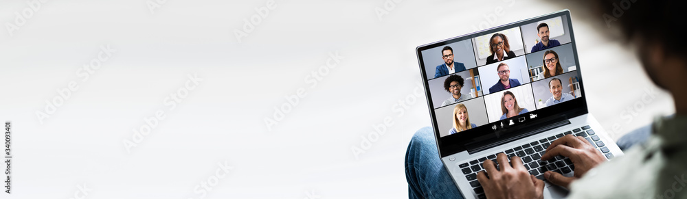 Young Man Using Laptop At Home - obrazy, fototapety, plakaty 