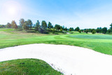 Fototapeta Miasto - Sand bunkers at the beautiful golf course.