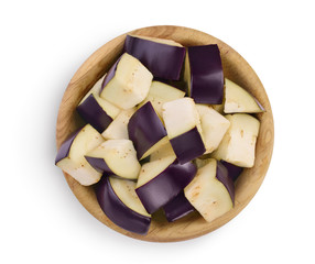 Wall Mural - Eggplant or aubergine diced in wooden bowl isolated on white background with clipping path and full depth of field. Top view. Flat lay.