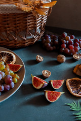 Wall Mural - Figs, grapes healthy vegetarian lunch