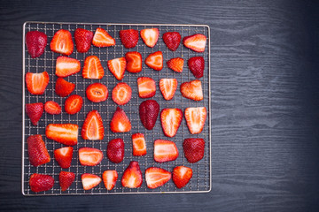 Wall Mural - Background texture of sliced strawberries