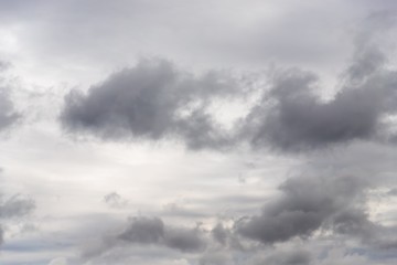 Wall Mural - Dramatic gray clouds in the sky. Beautiful gray and white cloudy sky