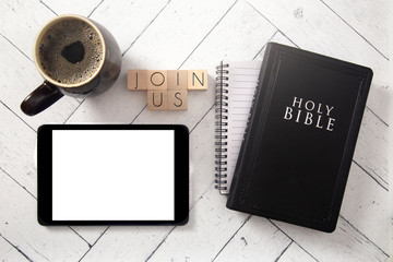 Sticker - Join Us in Block Letters on a White Wooden Table with a Bible and Tablet