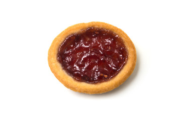 Wall Mural - Closeup of mini tartlet with strawberry jam on top view on white background