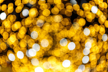 Abstract golden and yellow bright circle bokeh background