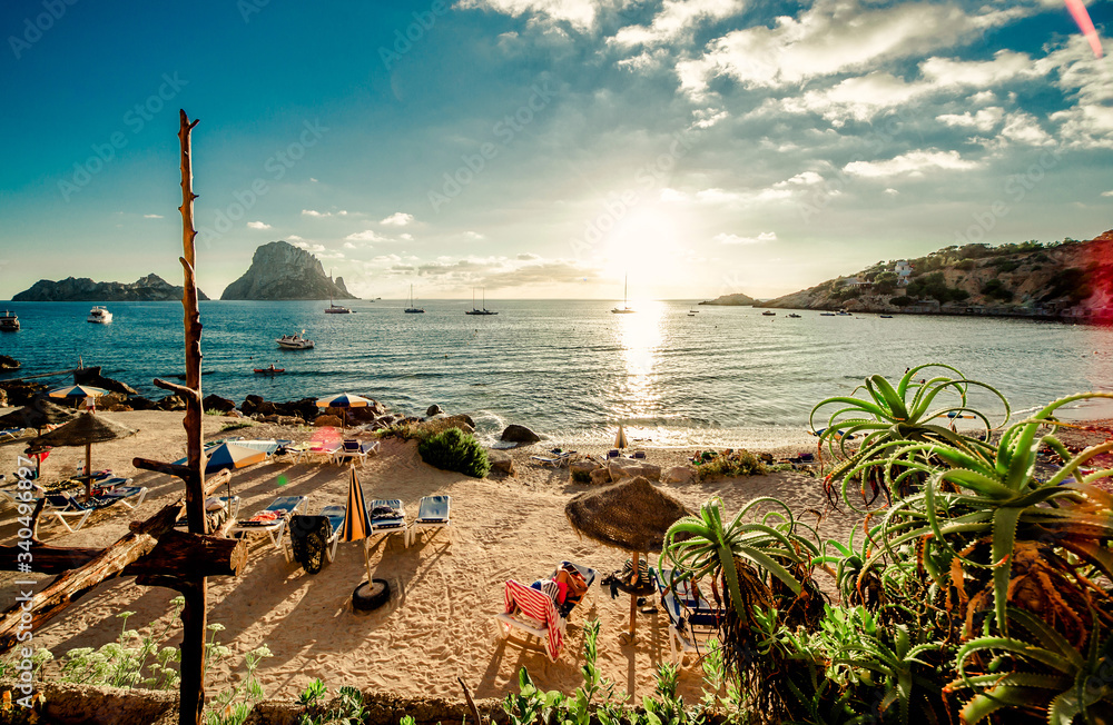 Scenic View Of Beach And Sea Against Sky At Ibiza Island - obrazy, fototapety, plakaty 