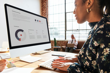 Woman using a computer in the office