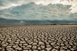 © Panya Studio - Climate change and drought land, Rainstorms are falling on the dry ground, Global warming concept,