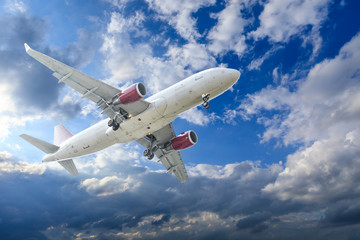 Commercial airplane flying in the sky,travel concept.