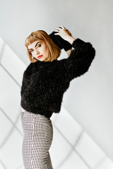 Poster - Model posing in a natural light studio