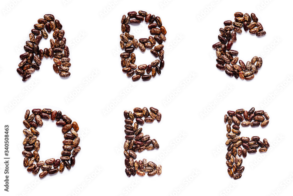 Designer spotted beans in the shape of letters for the designer Stock ...
