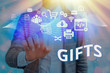 © Artur - Word writing text Gifts. Business photo showcasing a thing given willingly to someone without payment or a present