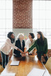 © rawpixel.com - Diverse businesswomen hands together