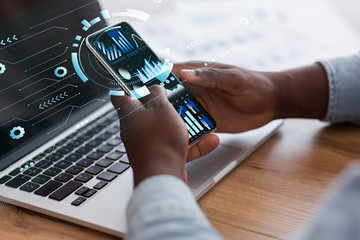 Poster - Businessman using smart phone with holograms datas