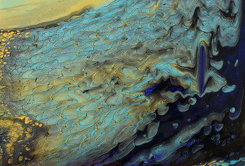 art photography of abstract marbleized effect background. Gold, black and blue creative colors. Beautiful paint