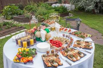 festive table with rolls and drinks