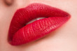 Close-up macro red matte lips. Clean skin. Natural retouching