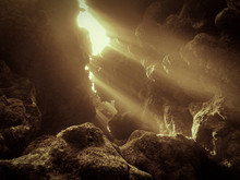Underwater Scene Of A Cave With Sunlight