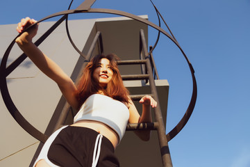 Wall Mural - Portrait pretty young asian woman. Attractive beautiful young lady get fun, happiness with smile face. Pretty woman wears shorts, sportswear in summer. Charming beautiful young woman love nice weather