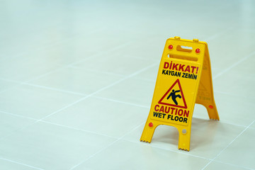 Warning signs for slippery floors