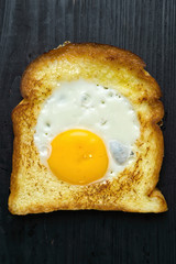 Wall Mural - egg in a hole fried sandwich breakfast