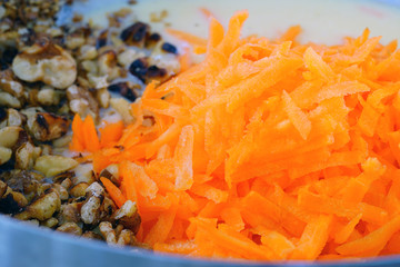 Wall Mural - Making the batter for a vegan carrot cake in a bowl