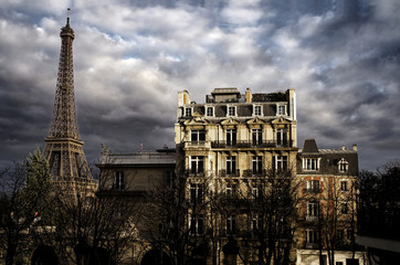 Fototapete - Eiffel Tower and typical Paris Building after the Storm and under a beautiful Light