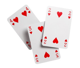 Playing cards for poker, gambling and casinos, red hearts isolated on white background with clipping path