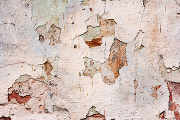 Texture of a concrete wall with cracks and scratches which can be used as a background