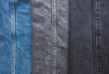 Jeans fashion background, different colours. Close up