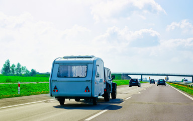 Canvas Print - Camper rv at road Poland reflex