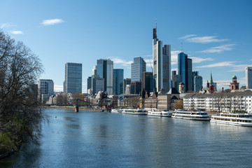 Frankfurt, Germany - March 31, 2020: frankfurt skyline view from main riverside in springtime