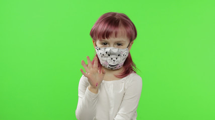 Little girl in medical face mask. Isolation. World pandemic COVID-19 coronavirus